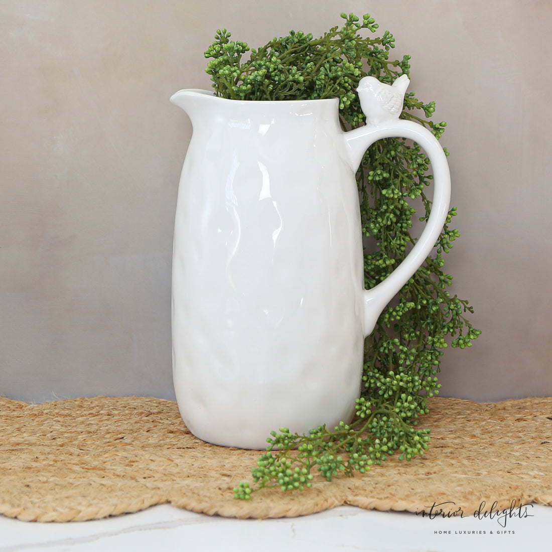 Dimpled White Ceramic Pitcher with Bird