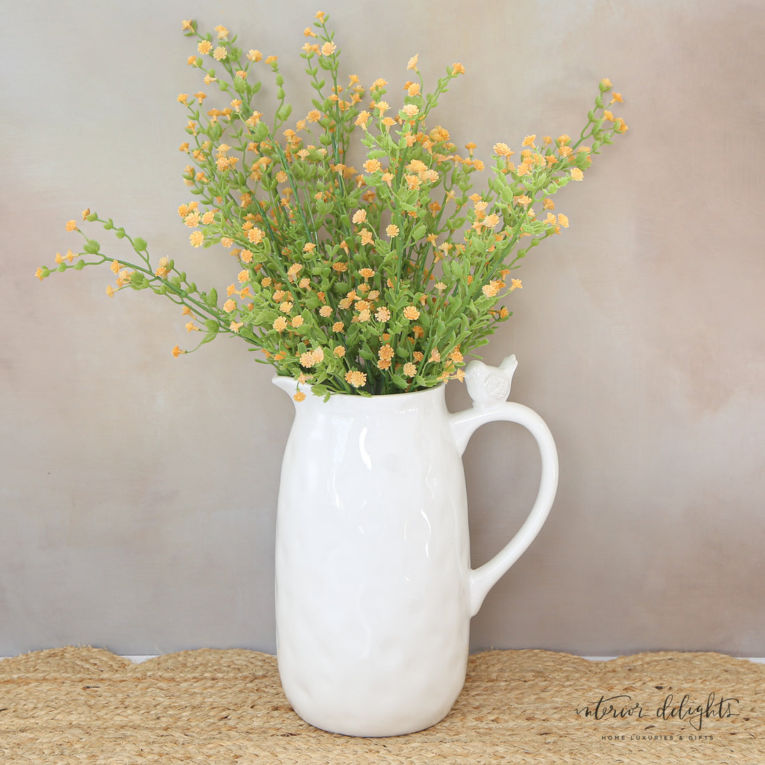 Dimpled White Ceramic Pitcher with Bird